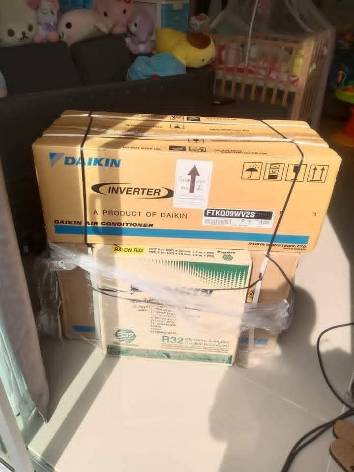 ครอบผ้ากันน้ำก่อนล้างแอร์ผนัง